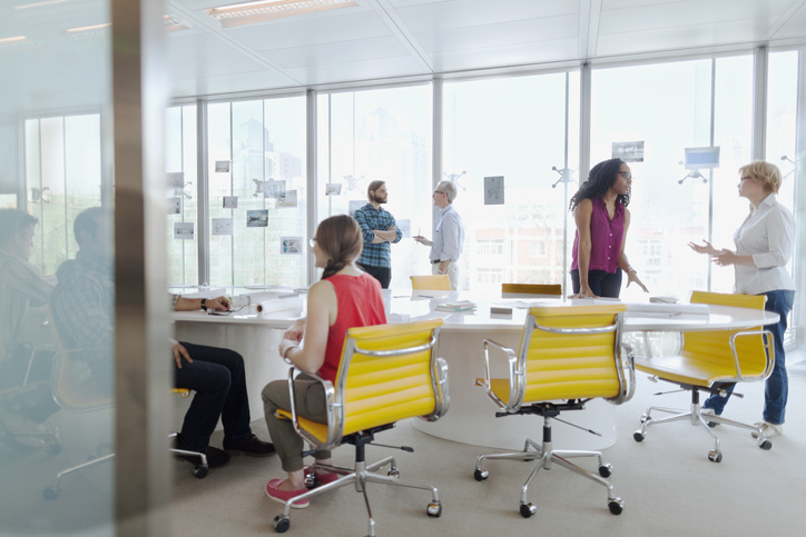 Group of business people meeting in conference room | Advanced Heating and Air Conditioning